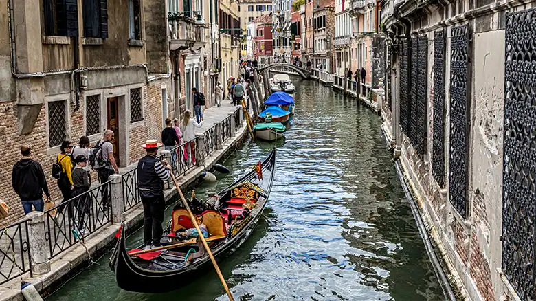 Venice canal and historic buildings in soft autumn light