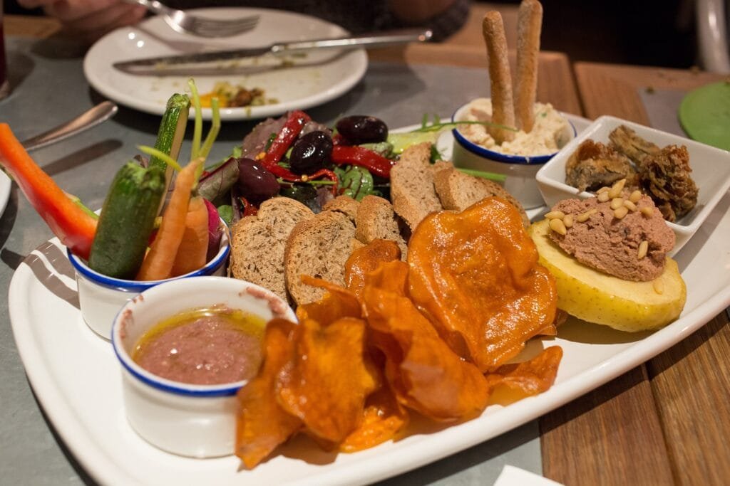 a plate of spanish tapas on a table