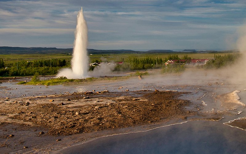 a geyser in a field