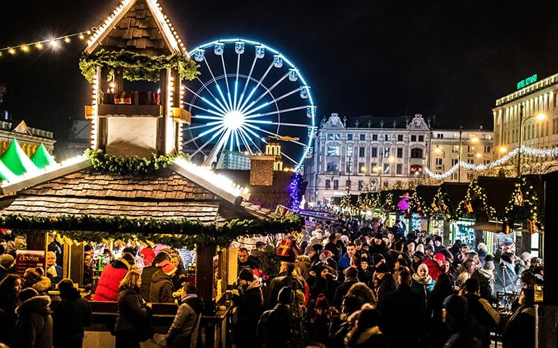 christmas market breaks - a crowd of people at a fair