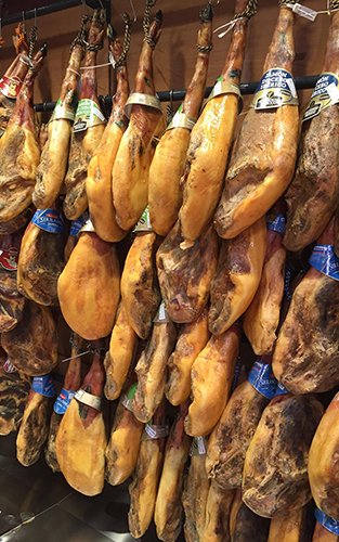 a group of meat on a wall